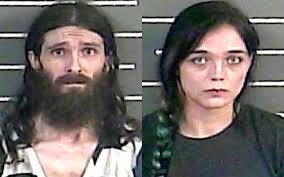 Pike couple charged with taking money from mislaid purse