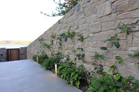 This sitting area with pillows to carefully match the stone, tie the whole area tog ether for a comfortable entertaining space. Stone Cladding Installation Tips Eco Outdoor