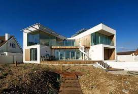 Moving Company Quotes Tips To Plan Your Move Mymove Modern Beach House Small Beach House Plans Beach House Plans