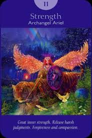 Under a golden sky a woman pets a lion on its forehead and lower jaw. Angel Tarot Card 3 Strength