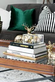But we completely guarantee that the end result couldn't be more rewarding. Green Velvet Pillows For Christmas Brass Deer And Coffee Table Books For Simple And Elegant Christmas Decorating This Is Our Bliss This Is Our Bliss