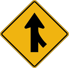 Road signs include regulatory signs, traffic lights, turn signals, curb markings, and railroad crossings. Signs