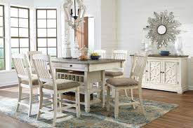 A counter placed at a lower height brings down the eating area to a more comfortable level and can be used in combination with regular dining chairs. The Bolanburg Antique White 8 Pc Rectangular Counter Height Dining Set Available At Royal Star Furniture Serving St Paul Mn