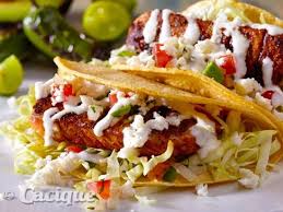 You want to serve a few different options that enhance the experience of the remove the fish from the grill and place fillets on a large serving platter. Cacique Grilled Fish Tacos With Tequila Lime Crema Cacique Usa Grilled Fish Tacos Food Network Recipes Recipes