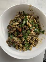Homemade Pesto Pasta With Olive Tapenade Arugula And Sundried Tomatoes Food Foods Pasta With Olives Sundried Tomato Pasta Homemade Pesto