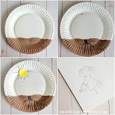 Be prepared to get a little sticky! Paper Plate Growing Flower Craft I Heart Crafty Things