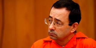 Larry Nassar, a former doctor for USA Gymnastics, is sentenced to prison  for sexual assault