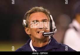 Denver Broncos head coach Mike Shanahan talks to tight end Jed Weaver in  the morning practice at training camp in Denver, Saturday, July 31, 2004.  (AP Photo/Jack Dempsey Stock Photo