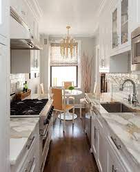 Cozy Manhattan Apartment Combines Vintage Flare With Modern Touches Galley Kitchen Design Kitchen Remodel Small Kitchen Layout