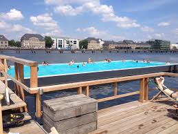Badeschiff In Berlin A Shipping Container Turned Pool Lowered Into The Spree Shipping Container Swimming Pool Container Pool Shipping Container Pool
