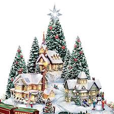Now, the beloved christmas artistry of thomas kinkade inspires a sculpted village scene at the center of a beautiful floral arrangement. The Bradford Exchange Thomas Kinkade Christmas Village Floral Centerpiece With Lights Music And Motion Pricepulse