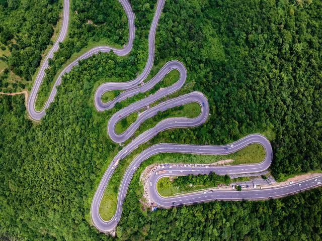 The serpentine curves of Patratu Valley, AI generated