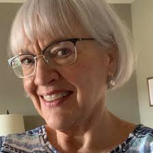 Fiber artist donates 60 handmade hats to charity