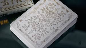 Theory11 is proud to present monarch mandarin edition playing cards. White Monarch Limited Edition Playing Cards