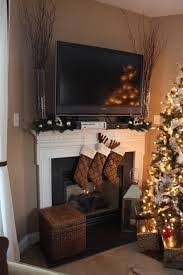 Decorating Around A Tv Console Decorating Around A Wall Mounted Tv How To Decorate Wall Behind Decor Around Tv Christmas Mantle Decor Christmas Fireplace Decor
