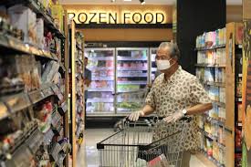 An electronic shop staff wearing a face mask watches live broadcast of malaysian prime minister muhyiddin yassin speak at a shopping outlet in kuala lumpur, malaysia, monday, aug. Pm Muhyiddin Visits Supermarket Happy People Observing Social Distancing Prime Minister S Office Of Malaysia