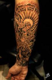 Create a modern take on st michael the archangel for my. Lil B Tattoo Saint Michael Forearm Tattoos St Michael Tattoo Arm Tattoos For Guys