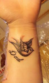 Beautiful dove tattoo on wrist. 49 Creative Dove Tattoos On Wrist