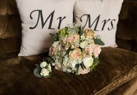 Although they hit the freezer aisle with spoons (as one does) after exchanging rings, the actual ceremony took place in the shop's floral department with guests and shoppers bearing witness. Wedding Flowers For Every Budget Featuring Diy Bridal Bouquets Kansas City Small Wedding Venues The Vow Exchange Wedding Chapels In Missouri