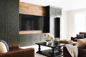 You have to choose one with the right size and shape that will also suit and fit your sofa set. Brown Leather Sofa And Black Balustrade Coffee Table Transitional Living Room