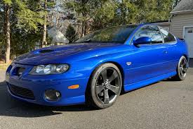 Image result for Dark Ming Blue 2004 Pontiac