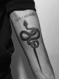 Best Snake Tattoos Tattoo Insider Snake Tattoo Design Snake Tattoos Tattoos