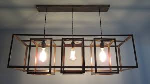 Pin By Beachbrights On Mom S New House Rustic Light Fixtures Rectangular Chandelier Rectangular Light Fixture