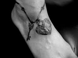 This piece has very nice flow lines and beautiful filigrees that give it a dynamic undulating motion on the body. 30 Simple Key Tattoos On Ankle