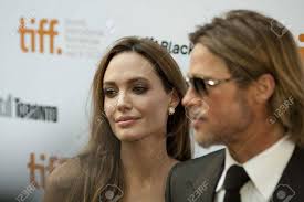Brad And Angelina Grace The Red Carpet Together At The 2011 Toronto  International Film Festival En Route To The Screening Of Brad's Movie  Moneyball Stock Photo, Picture and Royalty Free Image. Image 17202131.