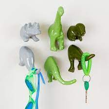 Triceratops decorative dinosaur wall hook. 11 Cool Wall Hooks To Help Kids Get Their Stuff Off The Ground Wall Hooks Kids Wall Hooks Dinosaur Room