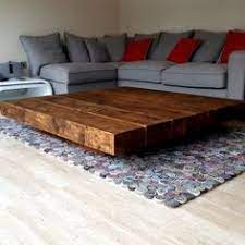 Any further, and you won't be able to comfortably reach it when enjoying a snack or finding the remote. 16 Pedestal Coffee Table Ideas Coffee Table Table Coffee Table Design
