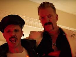 Slicked hair, leather jackets, tight jeans, sunglasses, knuckle tattoos, being tall and. Scissor Sisters Jake Shears Enlists Josh Homme For Big Bushy Mustache Video Watch Pitchfork