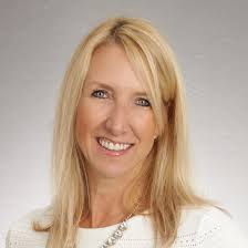 Kelli Mans, Real Estate