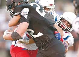 Madras football beats Sisters