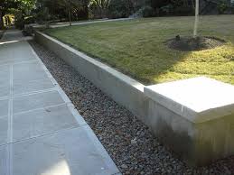 Here's what you'll need to get started… cinder blocks, both regular (with two openings) and half blocks (half the size, one opening); 25 Best Ideas About Concrete Retaining Walls On Pinterest Concrete Retaining Walls Poured Concrete Patio Landscaping Retaining Walls