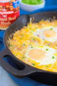 This tomatoey hash has chunky bits of corned beef combined with crisp potatoes, sweet peppers and onions. Corned Beef Hash And Eggs Pumpkin N Spice