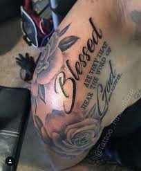 Blessed Or A Quote Right Behind Where This One Is On My Back A Flower On My Shoulder Top Tattoos Scripture Tattoos Verse Tattoos