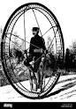 Man is riding in a giant wheel hi-res stock photography and ...