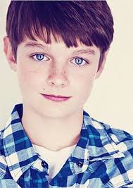 A good haircut says a lot about man. Boy Black Hair Blue Eyes Novocom Top
