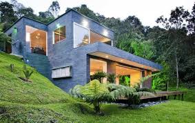Hillside House With Stone Wall And Glass Windows And Door With All Trees View In The Back Side Architecture P In 2021 Architecture House Facade House Hillside House