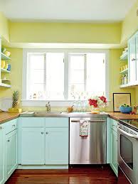 A Tropical Aqua Paint Gave Inexpensive Wood Cabinetry An Appealing Authentic Look In This Key West Florid Key West Kitchen Kitchen Inspirations Home Kitchens