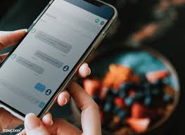 Download Premium Psd Of Text Messages On A Phone Screen Mockup At A Cafe Phone Screen Text Messages Phone Mockup