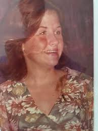 Can someone clean up this photo of my mom?