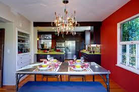One way to guarantee that you have a truly captivating dining room design is by adding in an accent wall. Bold Eclectic Dining Room With Red Accent Wall Hgtv