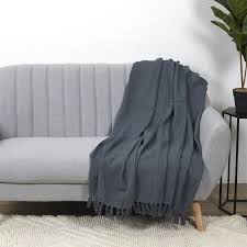 La couverture est faite de 100 % pure laine. Jete De Canape Gaufre 130x160cm Gris Anthracite