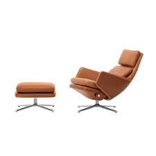 The original fiberglass chair is molded to be a comfortable seat and the legs are made from steel. Grand Relax Lounge Chair By Vitra