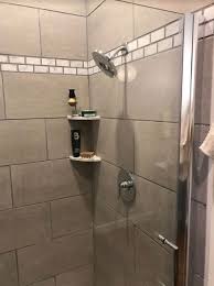 The walls are tiled with 12 x 12 inch ceramic tiles. Don T Glue Install An Easy In Wall Shower Shelf Instead Goshelf