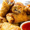 Preheat your air fryer to 400ºf, grease the basket with cooking spray, then place 4 egg rolls in the basket; 3