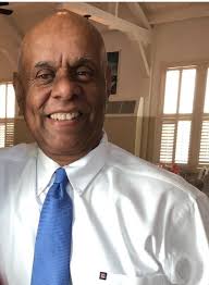 Can someone create an image with my uncle in the background for my cousin's  graduation?