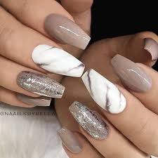 Water marble nails are a nail art technique implicating dropping nail lacquers into crystal clear water and it's much easier than it sounds. Marble Nails Art Addicfashion